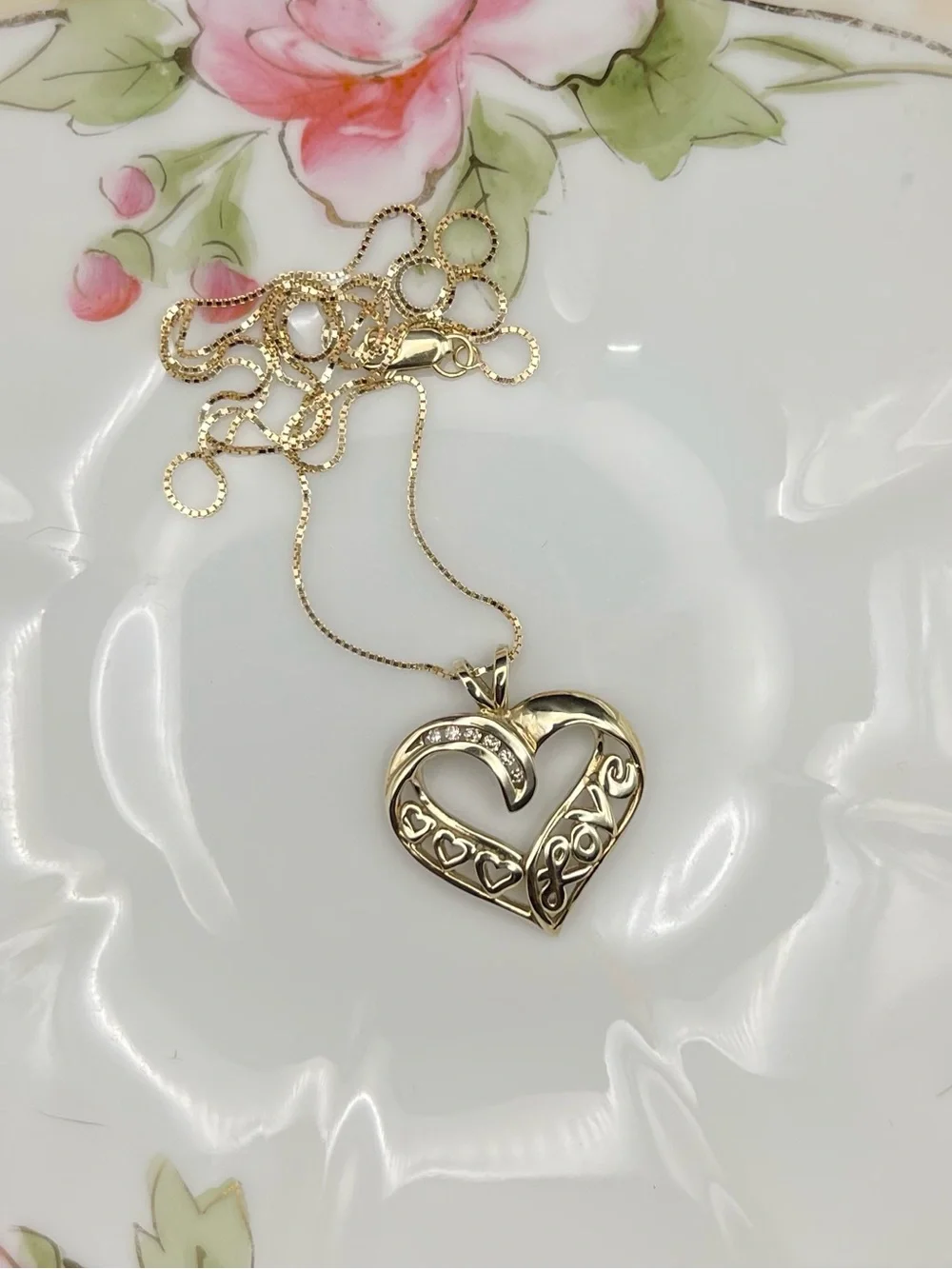 Estate piece, 14k yellow gold diamond LOVE love open heart necklace